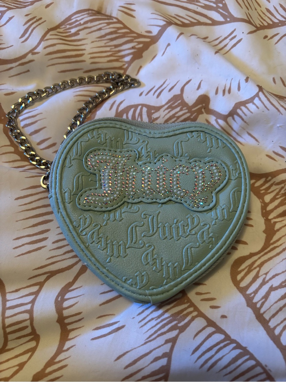 Juicy Couture Mint Green Heart wristlet with Crystal Logo.